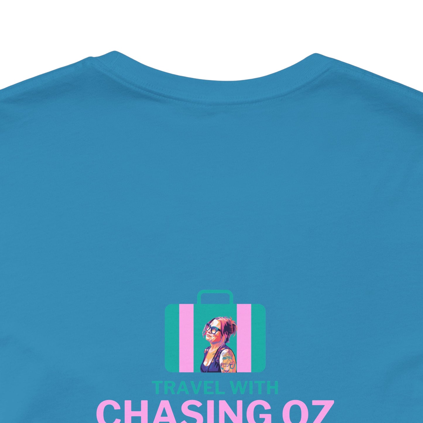 Logo on the BACK Travel with Chasing Oz - Unisex Jersey Tee